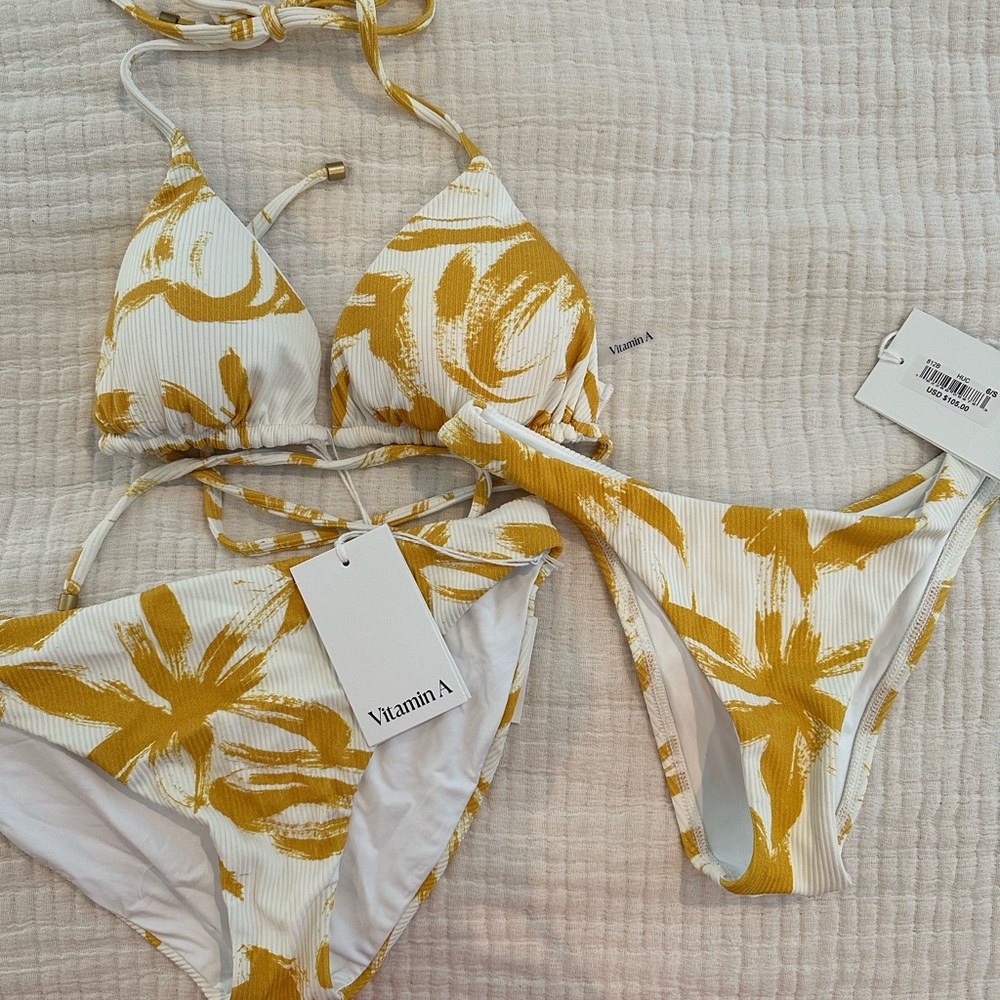 Never-worn, new with tags Vitamin A bikini set! One top with two bottom options